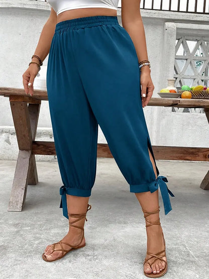 Pantalon Capri Large – Pantalon Décontracté Taille Élastique avec Fente Latérale et Détail Nœud