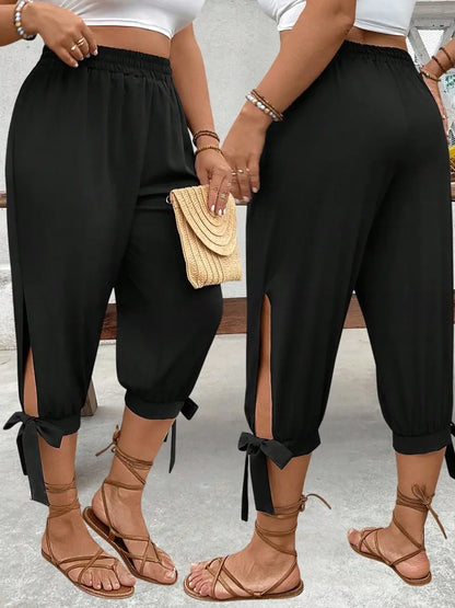 Pantalon Capri Large – Pantalon Décontracté Taille Élastique avec Fente Latérale et Détail Nœud