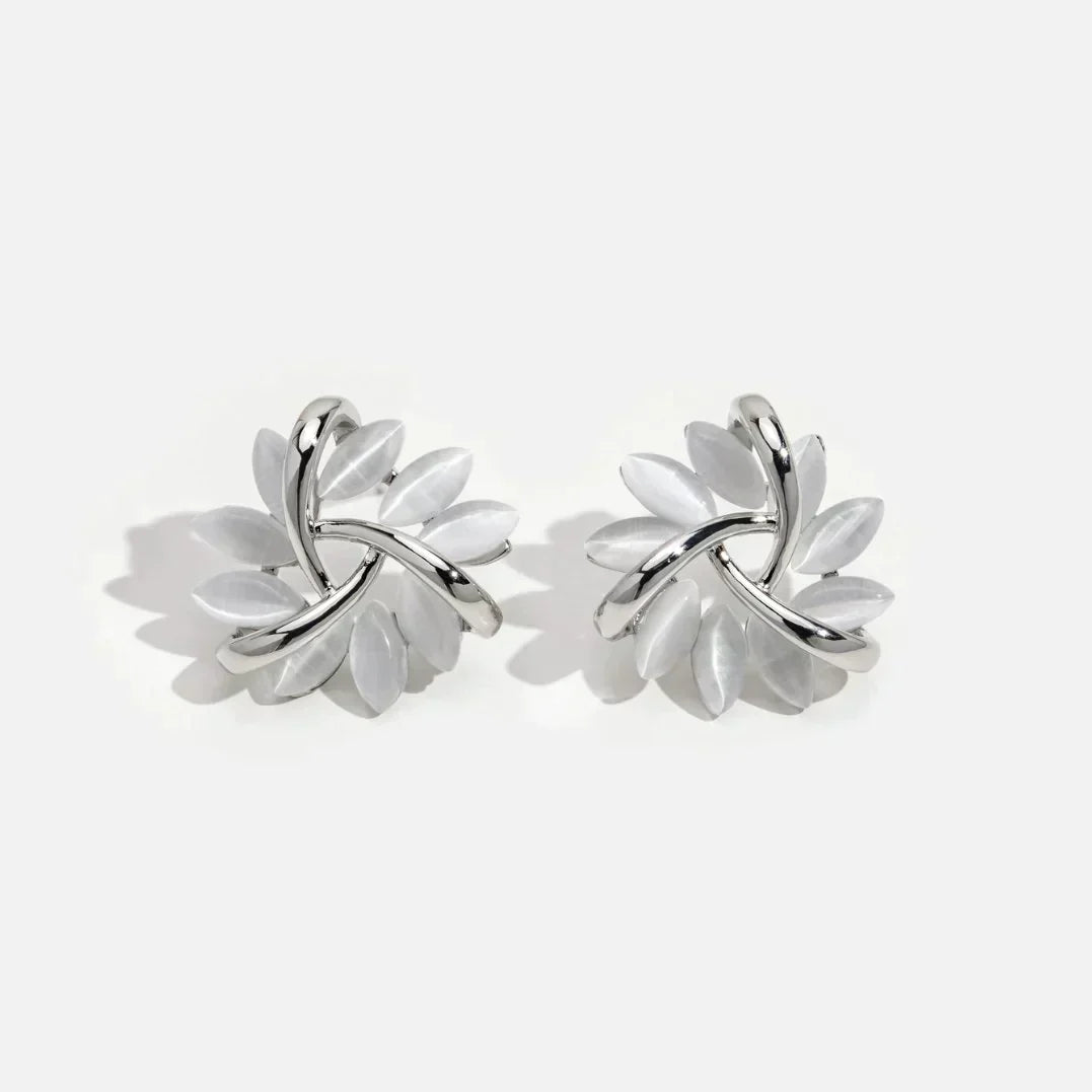 Boucles d’Oreilles Raffinées en Or et Argent Style Clous